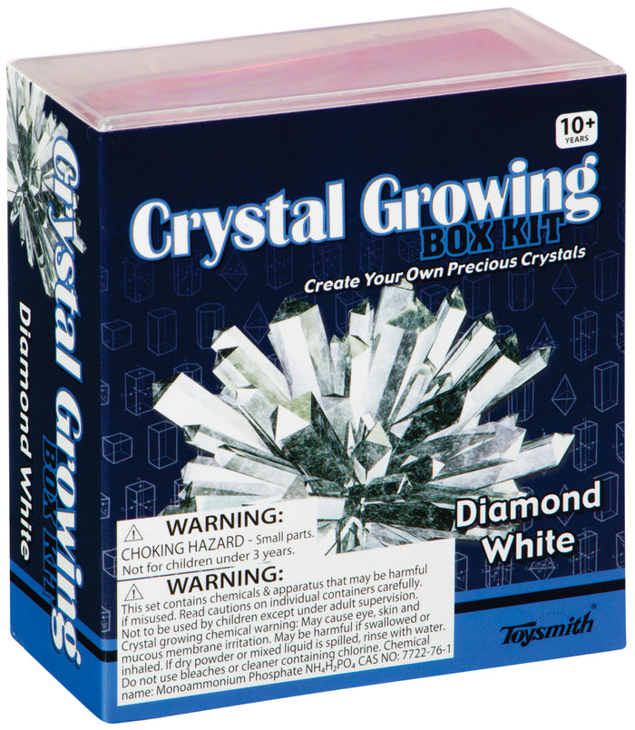The Toysmith Crystal Growing Kit is a DIY science kit for ages 10+, letting kids grow sparkling white crystals. The box shows crystal images and warns of small parts and chemical hazards. Brand: Toysmith.