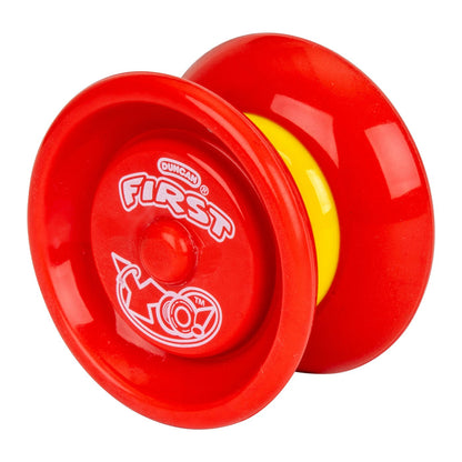 A Duncan First Yo! Yo-Yo Assortment is shown against a white background. This yo-yo features a bold red outer rim, yellow center, and white graphics and text on one side.