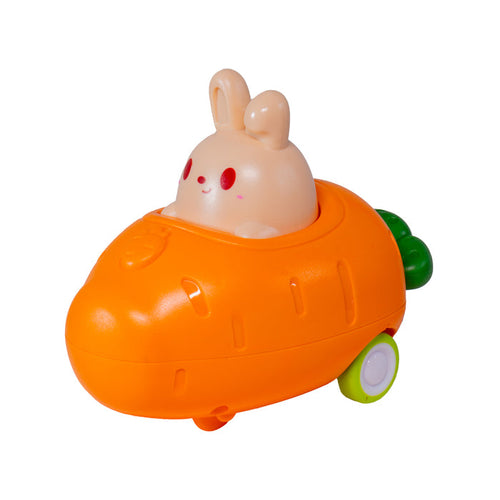 The Toysmith Push 'N Go Bunny is a toddler push toy shaped like an orange carrot with green wheels, featuring a cute light brown bunny with red eyes inside. Farm fresh fun for little ones. Plain white background.