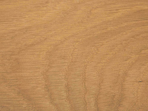 A close-up view of the James+James Satin on White Oak Sample showcasing a natural grain pattern with wavy lines and varying shades of light brown.