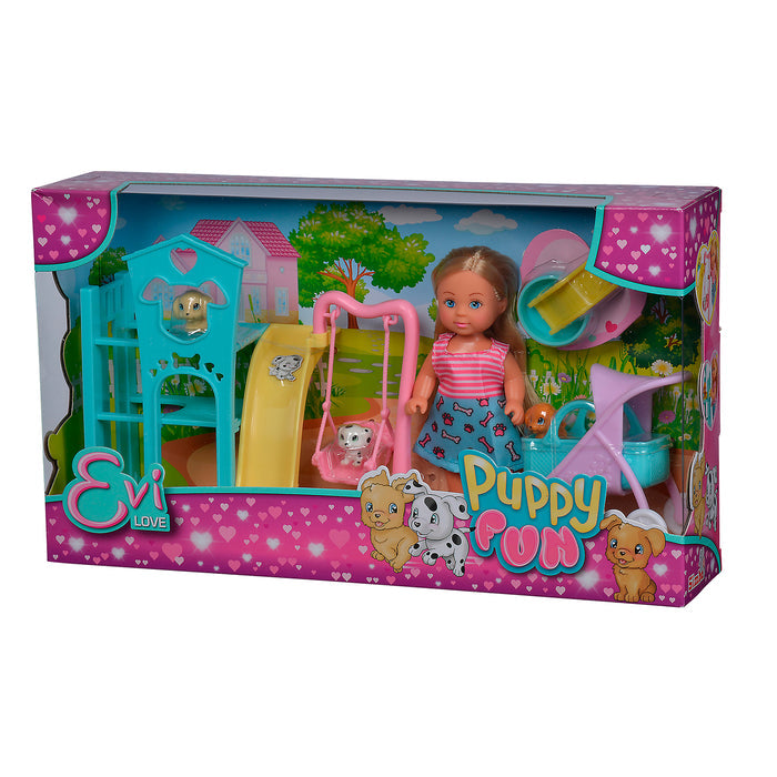 The Simba Dickie EL Puppy Fun playset includes an Evi doll in a striped shirt, two puppies, pet accessories, and a blue and yellow playground with slide and swing. Pink heart-themed packaging makes it an ideal toy for kids.