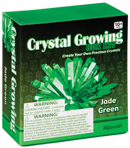 The Toysmith Crystal Growing Kit comes in a green and black box for ages 10+, featuring an illustration of green crystals, safety warnings, and is ideal as a DIY science kit or kids experiment.